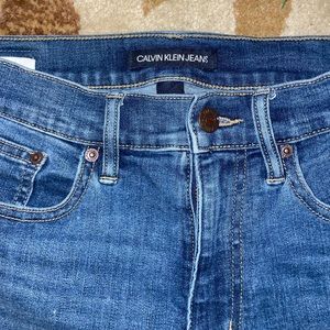 High-rise, cropped Calvin Klein jeans